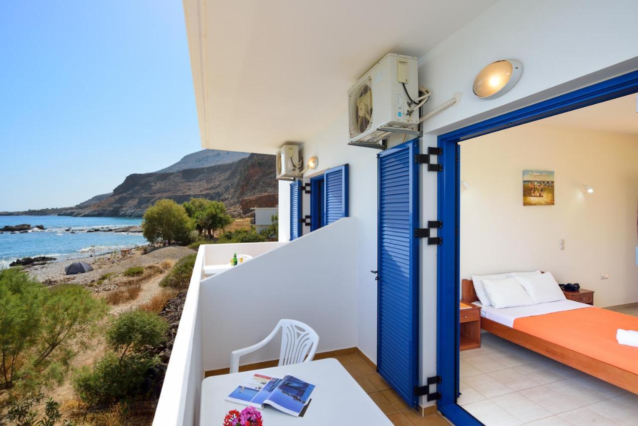 Taverna Akrogiali Loutrón Luaran gambar
